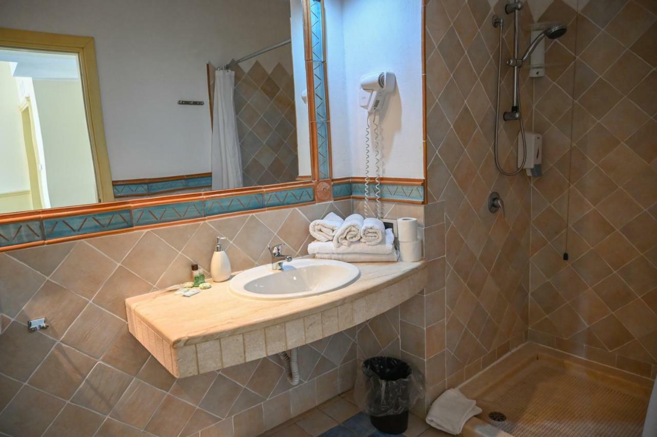 Hotel Baja Romantica بوسا المظهر الخارجي الصورة